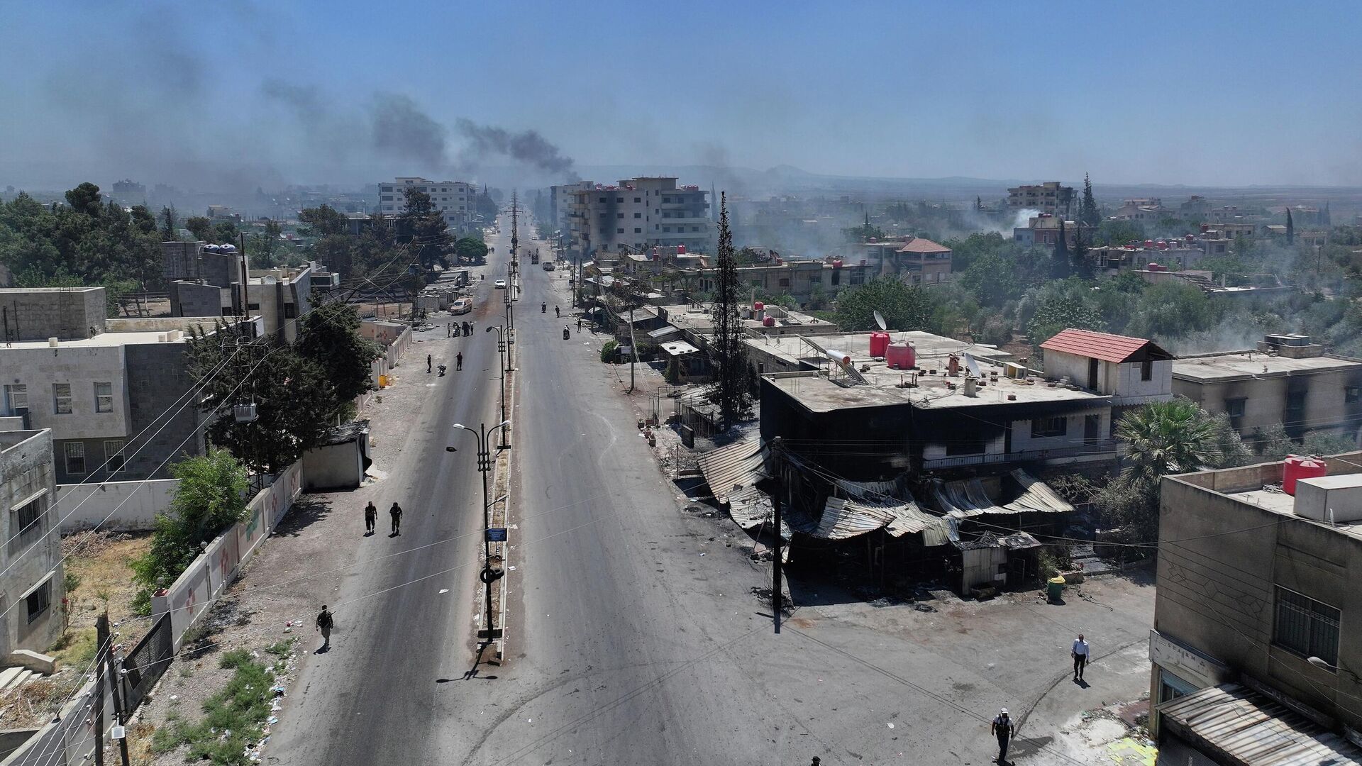 Дым после столкновения бедуинов и друзов в Сувейде - РИА Новости, 1920, 30.07.2025