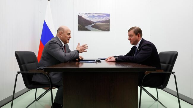 Председатель правительства РФ Михаил Мишустин во время встречи с главой Республики Алтай Андреем Турчаком в Горно-Алтайске. 23 июля 2025 Председатель правительства РФ Михаил Мишустин во время встречи с главой Республики Алтай Андреем Турчаком в Горно-Алтайске. 23 июля 2025