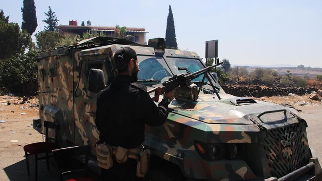 Сирийский полицейский в Эс-Сувейде