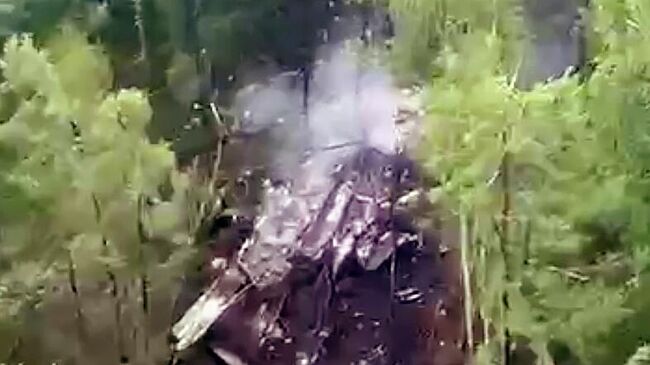 Место крушения пассажирского самолета Ан-24 авиакомпании Ангара в Приамурье. Кадр видео из соцсетей