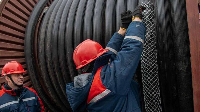 Сотрудники компании Россети Московский регион за работой