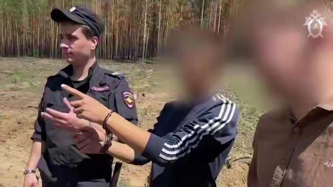 Один из подростков, в отношении которого возбуждено уголовное дело о совершении террористического акта, во время следственных мероприятий. Кадр видео