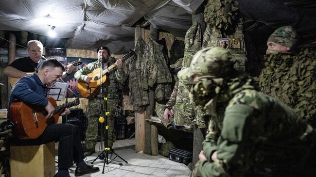 Выступление музыкантов в зоне СВО Выступление музыкантов в зоне СВО