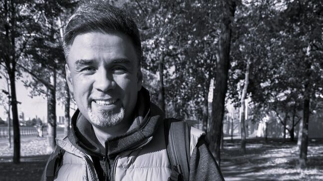 Комментатор фигурного катания Александр Гришин