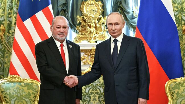 Владимир Путин и султан Ибрагим Владимир Путин и султан Ибрагим