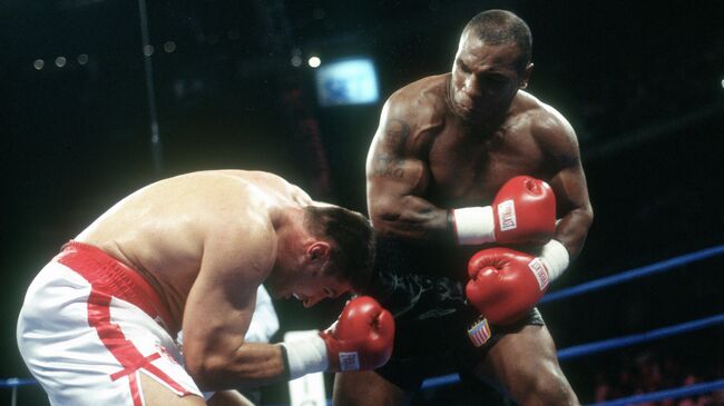Бой Майка Тайсона против Анджея Голоты Бой Майка Тайсона против Анджея Голоты