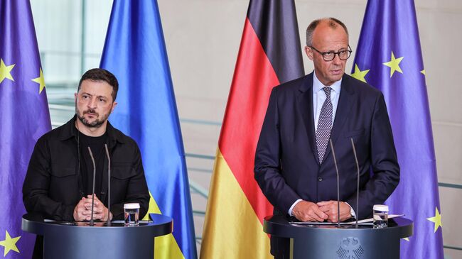 Канцлер Германии Фридрих Мерц и Владимир Зеленский принимают участие в совместной пресс-конференции в Берлине, Германия. 13 августа 2025
