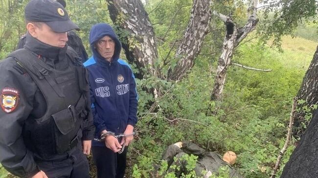 Виталий Манишин во время следственного эксперимента 