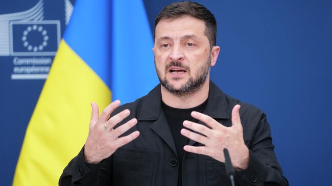 Владимир Зеленский во время пресс-конференции в штаб-квартире ЕС в Брюсселе, Бельгия