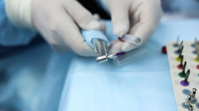 Имплантат Имплантат