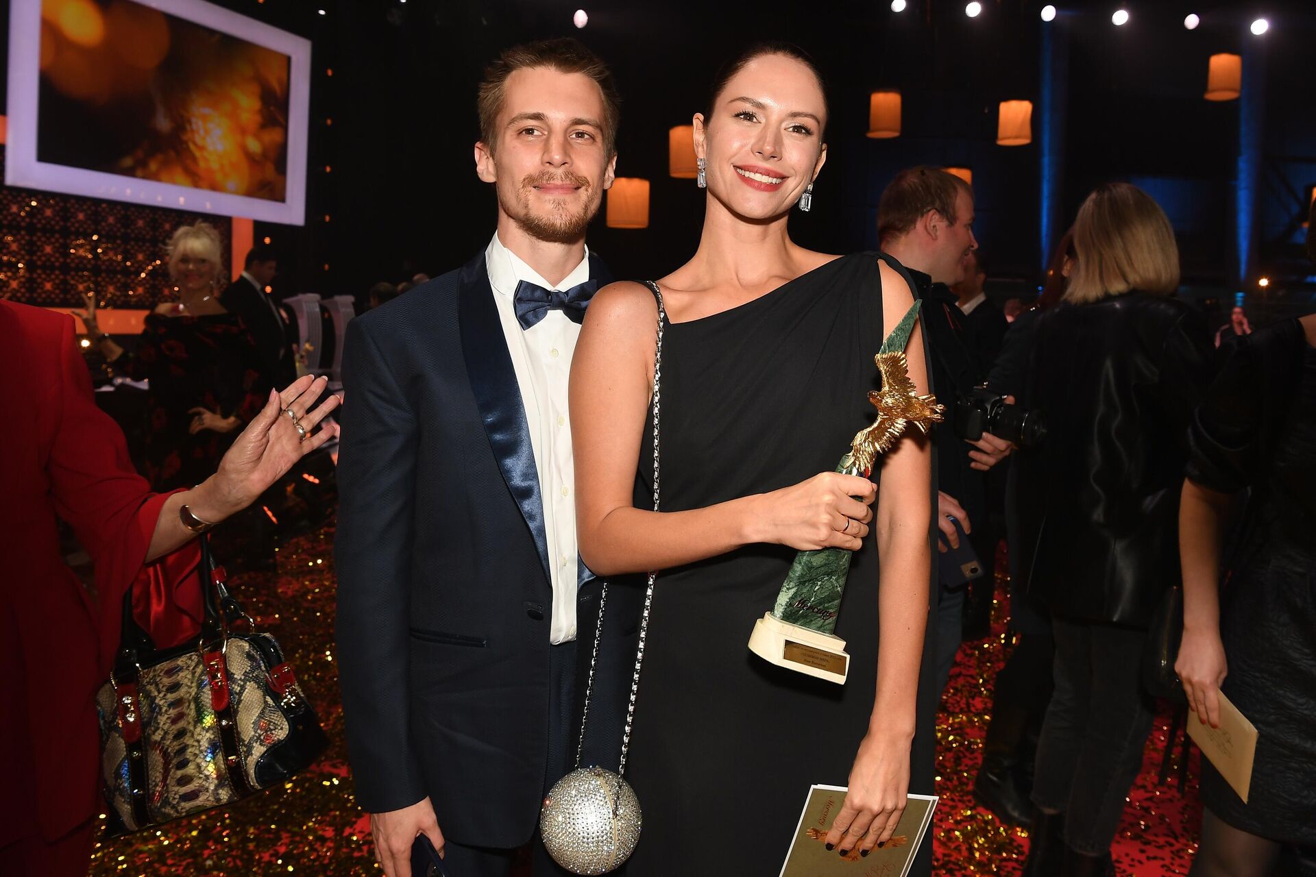 Актеры Иван Янковский и Диана Пожарская после торжественной церемонии вручения XXI Национальной премии в области кинематографии Золотой Орел Актеры Иван Янковский и Диана Пожарская после торжественной церемонии вручения XXI Национальной премии в области кинематографии Золотой Орел - РИА Новости, 1920, 20.08.2025