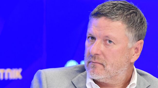 Евгений Кафельников