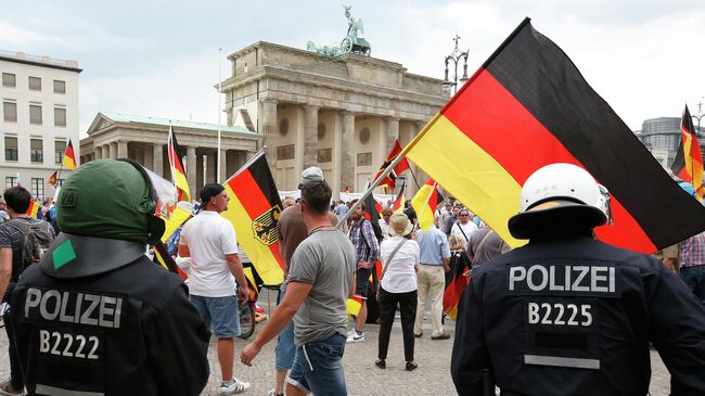 Акция протеста у Бранденбургских ворот в Берлине