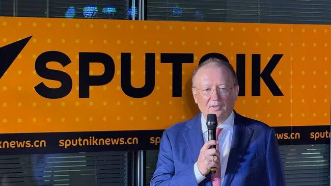 Торжественная церемония открытия нового офиса международного информационного агентства Sputnik в Пекине