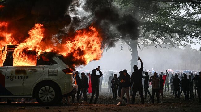 Беспорядки во время демонстрации против миграционной политики правительства Нидерландов в Гааге