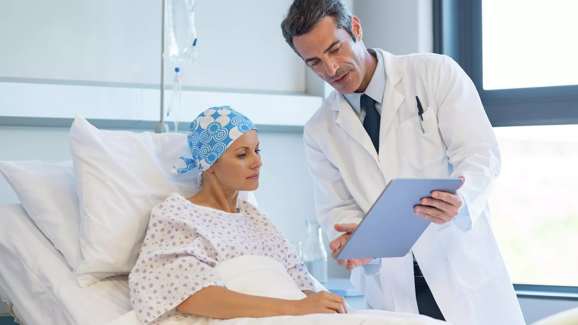 Doctor with a patient undergoing chemotherapy