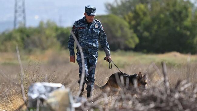 Сотрудник полиции на месте убийства Володи Григоряна