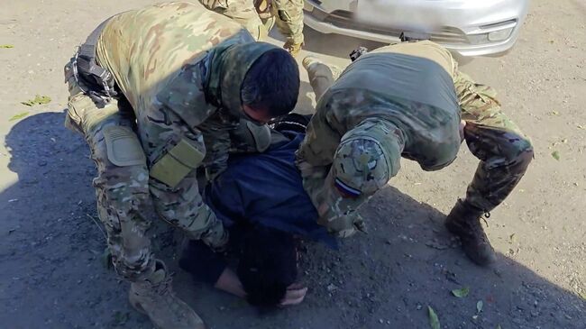 Кадры задержания в Мордовии сотрудника IT-компании по обвинению в госизмене