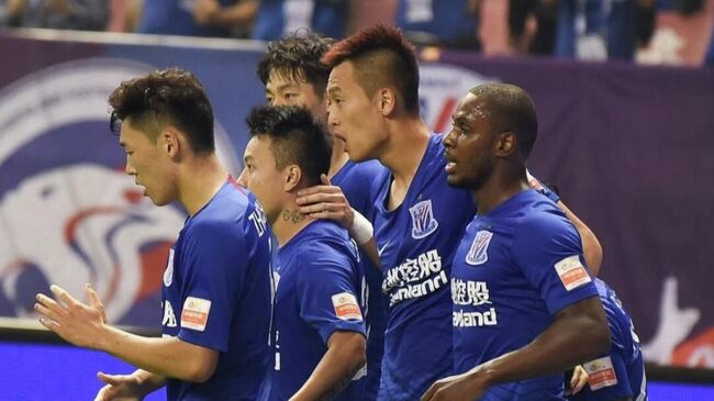 Футболисты Шанхай Шэньхуа