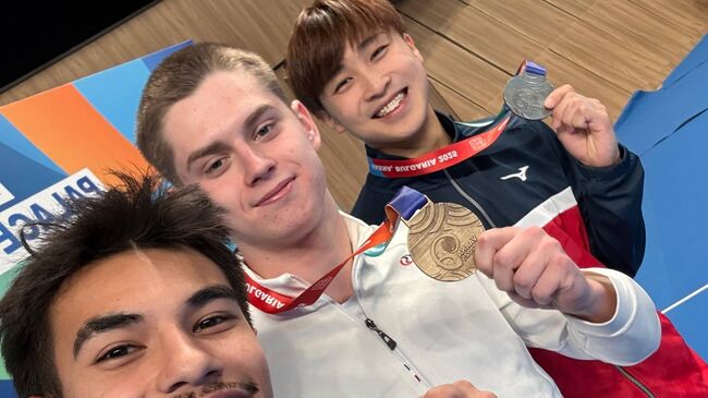 Батутисты Рубен Падилья, Дмитрий Нартов и Юсэй Мацумото 