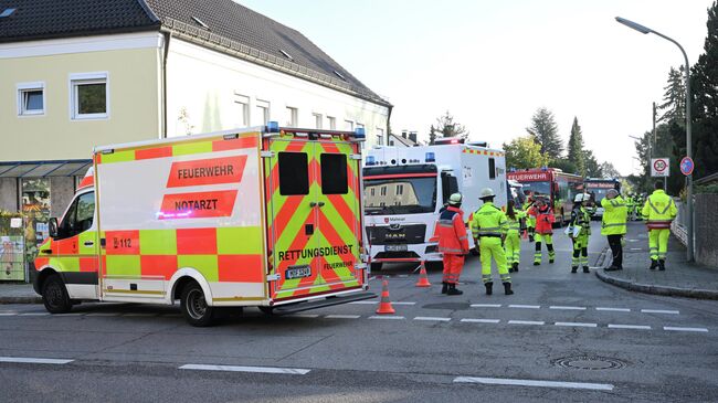 Пожарные на месте взрыва в Мюнхене, Германия. 1 октября 2025