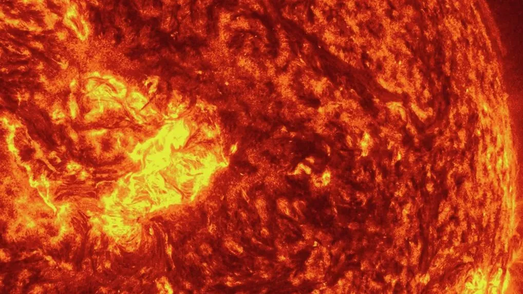 Solar flare with a large plasma ejection towards Earth