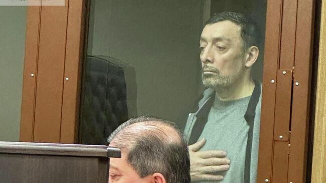 Миллиардер Сулейманов в зале суда