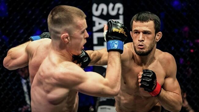 Усман Нурмагомедов и Пол Хьюз Усман Нурмагомедов и Пол Хьюз