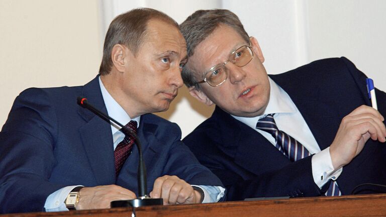 Президент РФ Владимир Путин и министр финансов РФ Алексей Кудрин на совместном заседании коллегий Минфина и Минэкономразвития РФ