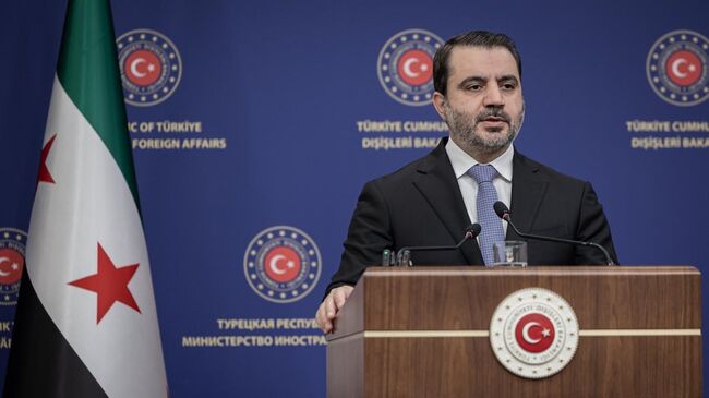 Глава МИД Сирии Асаад аш-Шибани во время пресс-конференции с министром иностранных дел Турции Хаканом Фиданом