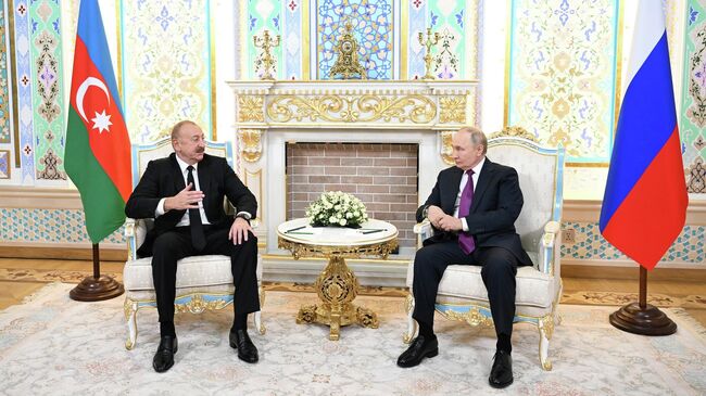 Владимир Путин и Ильхам Алиев во время встречи