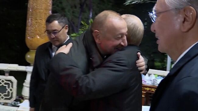 Путин и Алиев на неформальной встрече лидеров стран СНГ