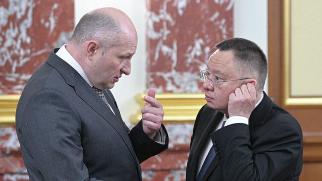 Глава МЧС РФ Александр Куренков (слева) и глава Минстроя РФ Ирек Файзуллин Глава МЧС РФ Александр Куренков (слева) и глава Минстроя РФ Ирек Файзуллин