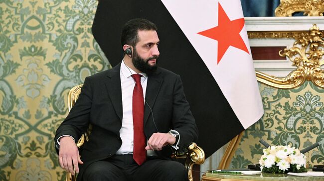 Президент Сирии Ахмед аш-Шараа во время встречи в Москве с президентом РФ Владимиром Путиным