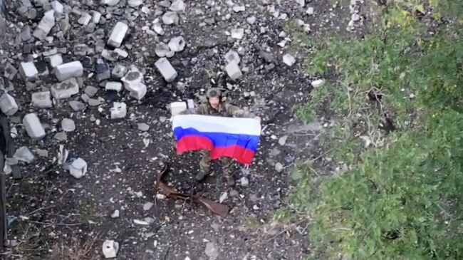 Российские флаги в освобожденной Новопавловке