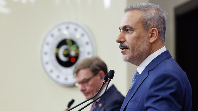 Глава МИД Турции Хакан Фидан на пресс-конференции с главой МИД Германии Йоханом Вадефулем в Анкаре