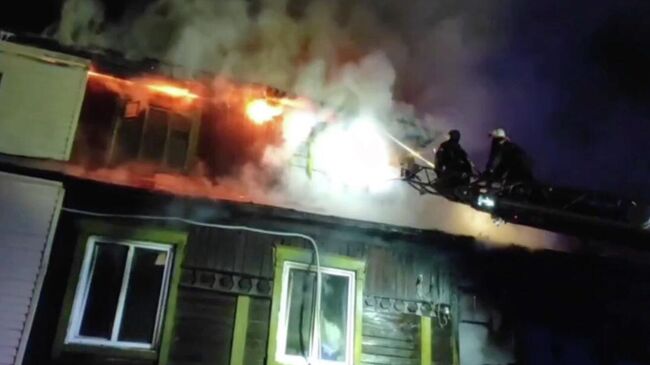 Ликвидация пожара в многоквартирном доме в Новосибирске