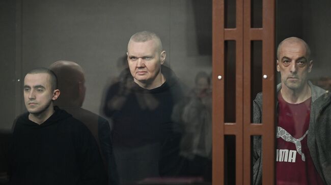 Участники незаконного вооруженного неонацистского формирования SS Медведи* на заседании суда в Ростове-на-Дону Участники незаконного вооруженного неонацистского формирования SS Медведи* на заседании суда в Ростове-на-Дону