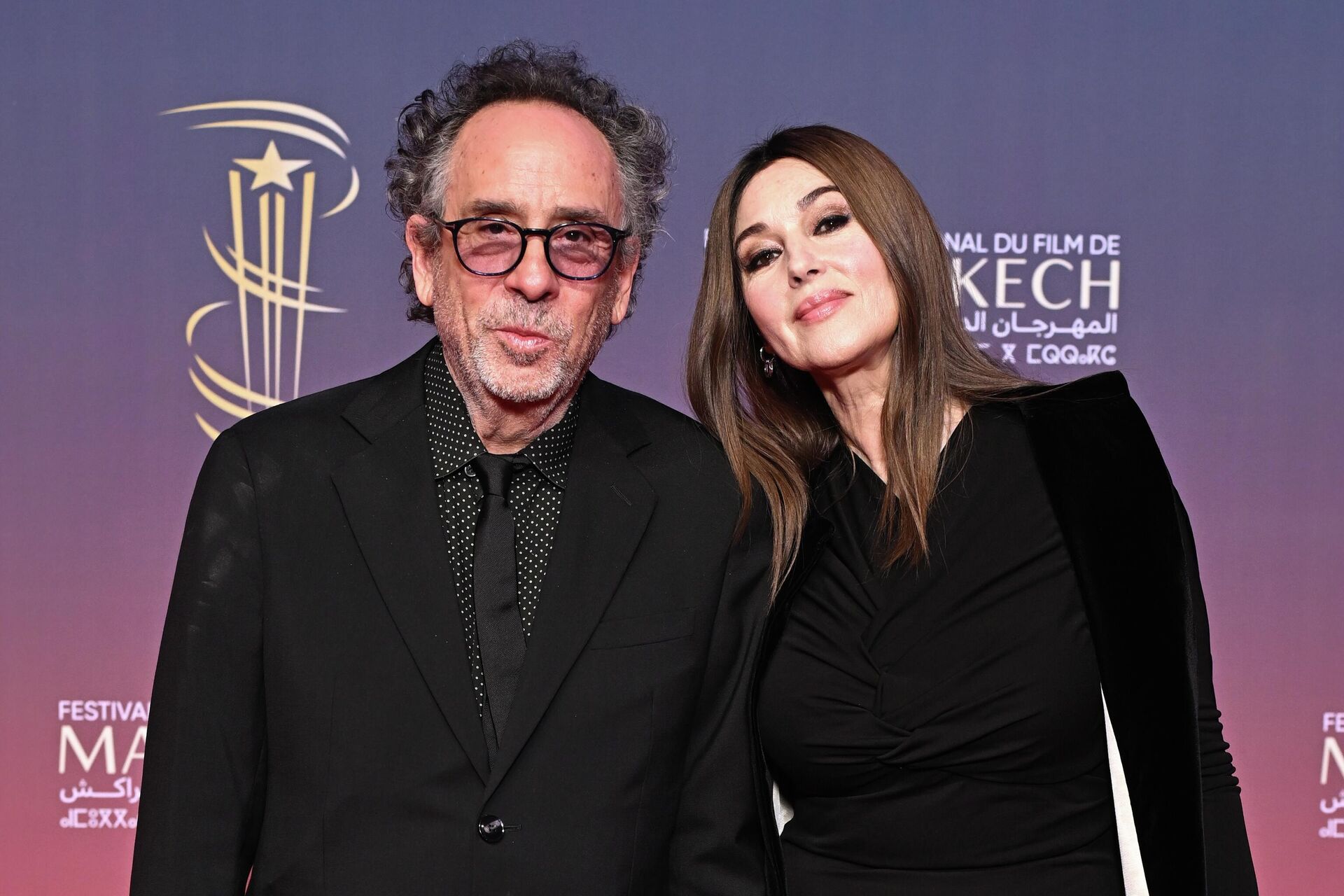 Тим Бертон и Моника Беллуччи на красной дорожке 21-го Марракешского международного кинофестиваля  Тим Бертон и Моника Беллуччи на красной дорожке 21-го Марракешского международного кинофестиваля  - РИА Новости, 1920, 28.10.2025