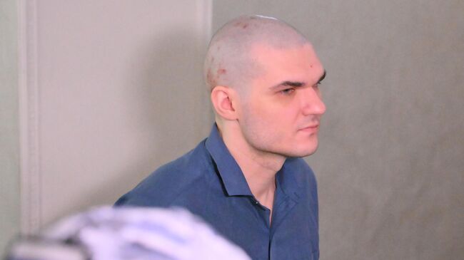 Евгений Серебряков, обвиняемый в подрыве автомобиля российского офицера на севере Москвы в 2024 году, во Втором западном окружном военном суде в Москве