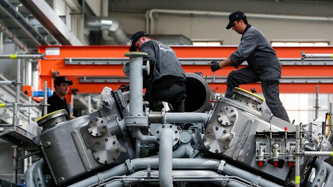 Работа машиностроительного завода в Германии. Архивное фото