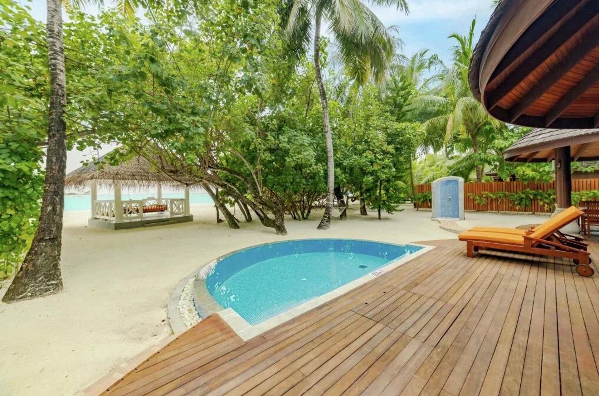 Пляжная вилла в Sun Siyam Olhuveli Пляжная вилла в Sun Siyam Olhuveli