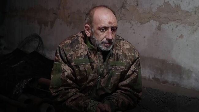 Украинский военнослужащий Николай Тимченко, взятый в плен у Красноармейска. Кадр видео