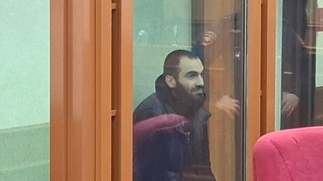 Марсель Гасанов, обвиняемый в занятии высшего положения в преступной иерархии, в здании суда