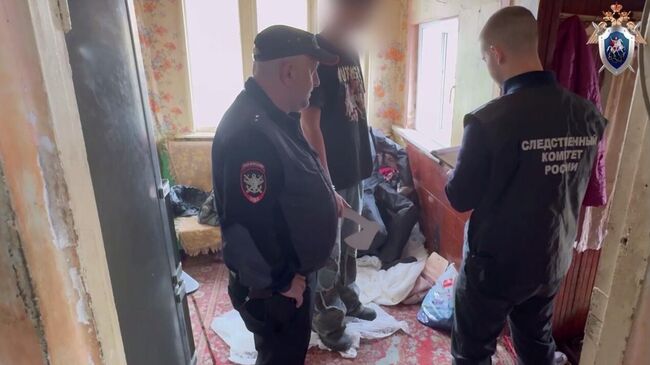 Следственные действия на месте убийства женщины в Туапсинском районе Краснодарского края. Кадр видео