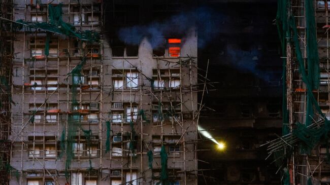 Ликвидация пожара в жилом комплексе Wang Fuk Court в Гонконге