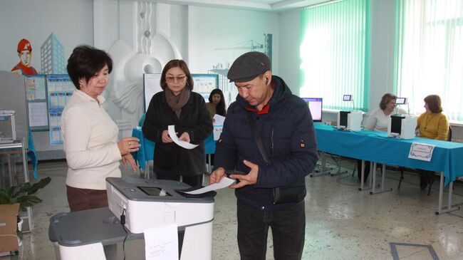 Голосование на выборах в парламент Киргизии