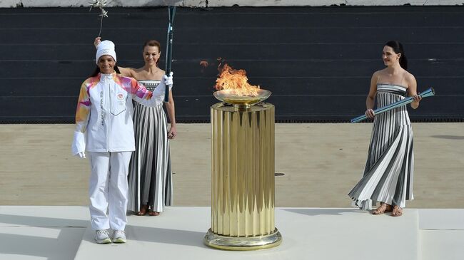 Церемония передачи олимпийского огня зимних Игр 2026 года Италии