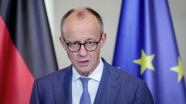 Канцлер Германии Фридрих Мерц на пресс-конференции с генсеком НАТО Марком Рютте. 11 декабря 2025