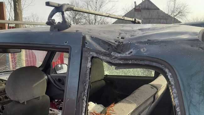 Последствия атаки ВСУ на автомобиль в Белгородской области. 14 декабря 2025
